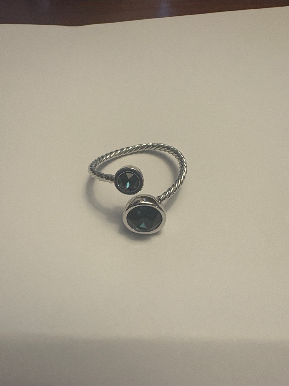 Touchstone Crystal Sterling-Tone Open Twist Ring with Dark Blue Gemstones
